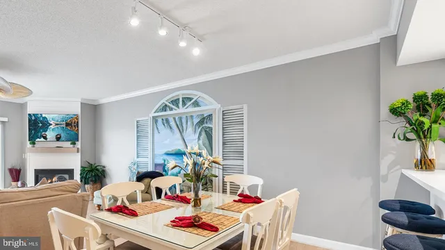 a very nice looking dining room with a table and chairs