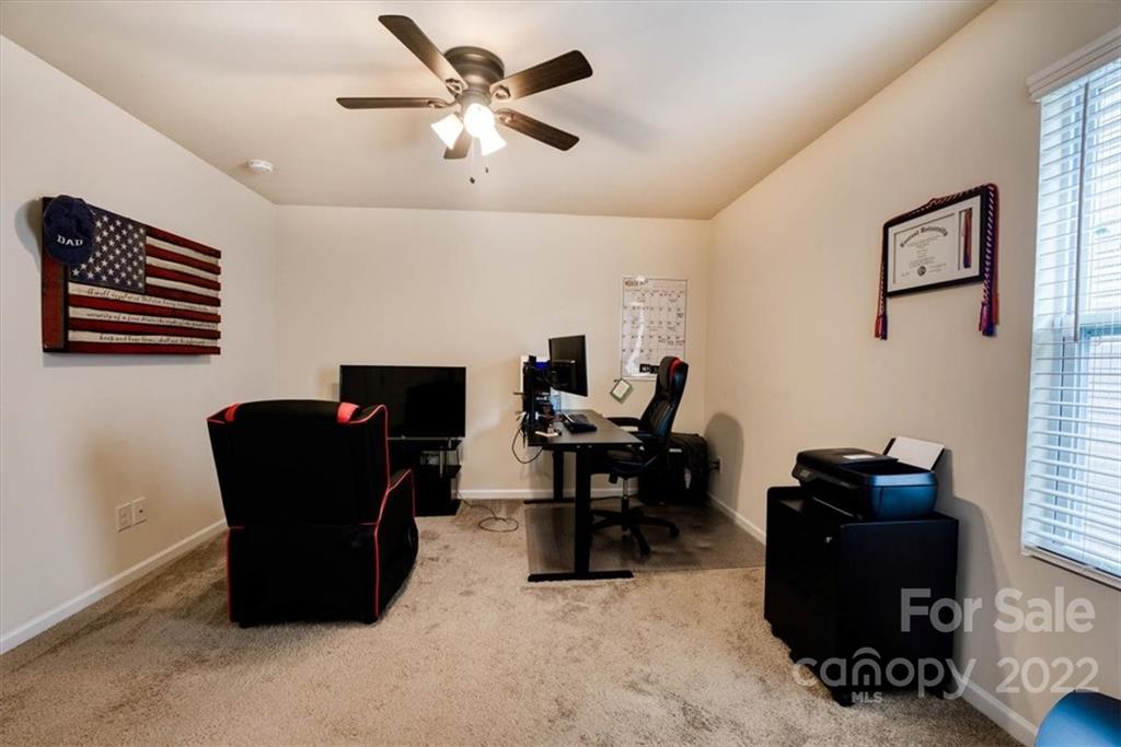 14015 Ridgewater Way Charlotte, NC 28278 - Photo 29 of 48 a work room with furniture and a window