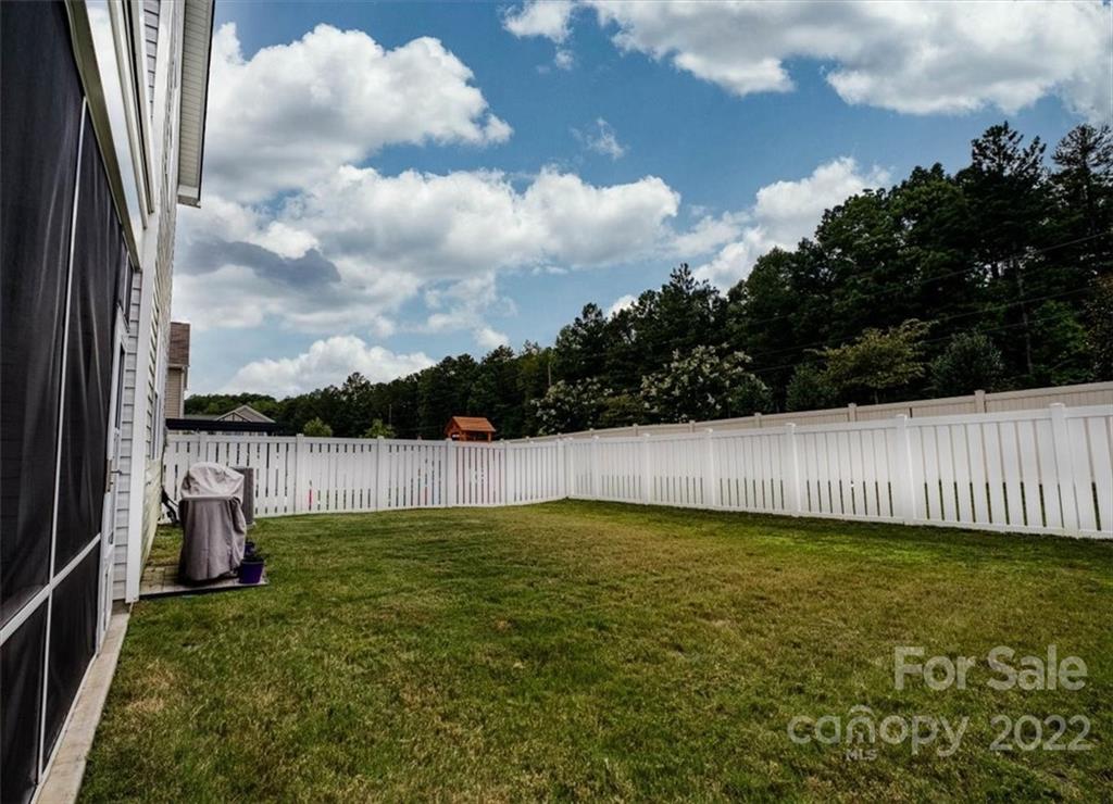14015 Ridgewater Way Charlotte, NC 28278 - Photo 44 of 48 a view of a backyard with a garden