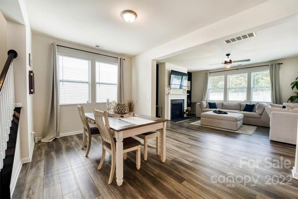 14015 Ridgewater Way Charlotte, NC 28278 - Photo 5 of 48 a view of a dining room with furniture window and wooden floor
