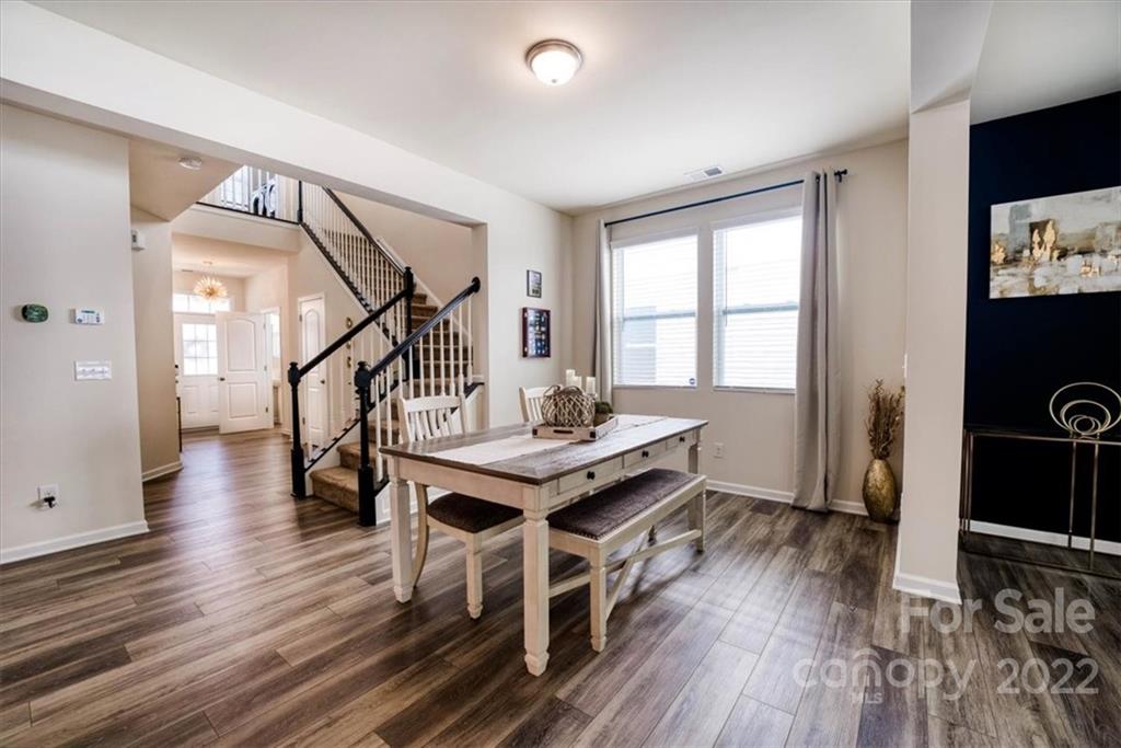 14015 Ridgewater Way Charlotte, NC 28278 - Photo 6 of 48 a living room with furniture and a wooden floor
