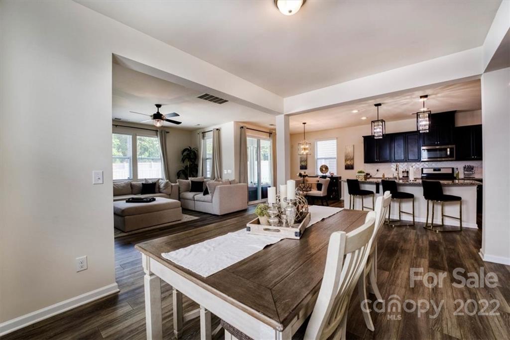 14015 Ridgewater Way Charlotte, NC 28278 - Photo 7 of 48 a view of a dining room with furniture