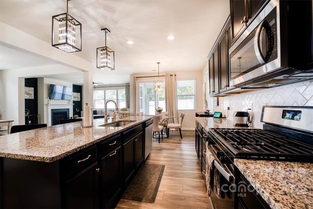 14015 Ridgewater Way Charlotte, NC 28278 - Photo 10 of 48 a kitchen with lots of counter top space