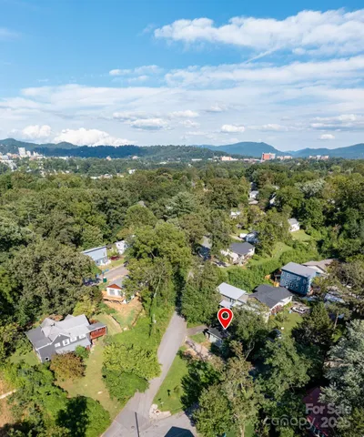 a view of a room with wooden walls