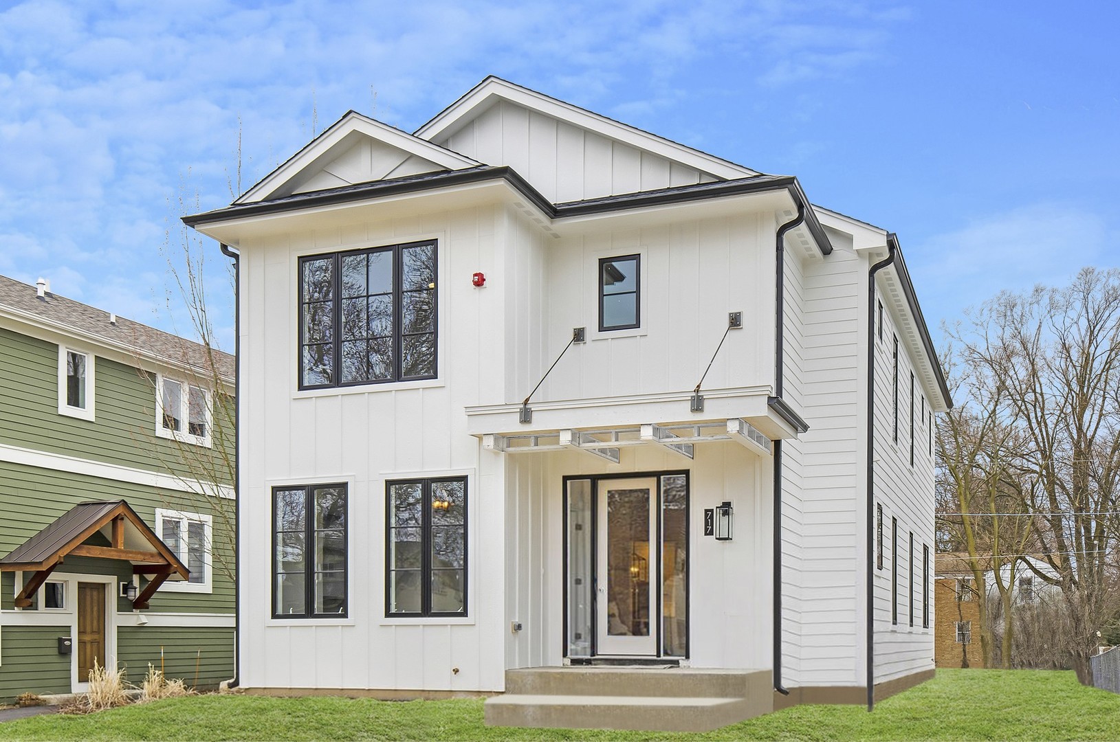 717 Meadow Lane Libertyville, IL 60048 - Photo 1 of 23 a front view of a house with a yard