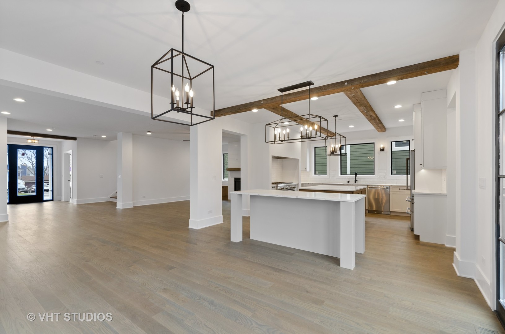 717 Meadow Lane Libertyville, IL 60048 - Photo 2 of 23 a view of a living room and kitchen