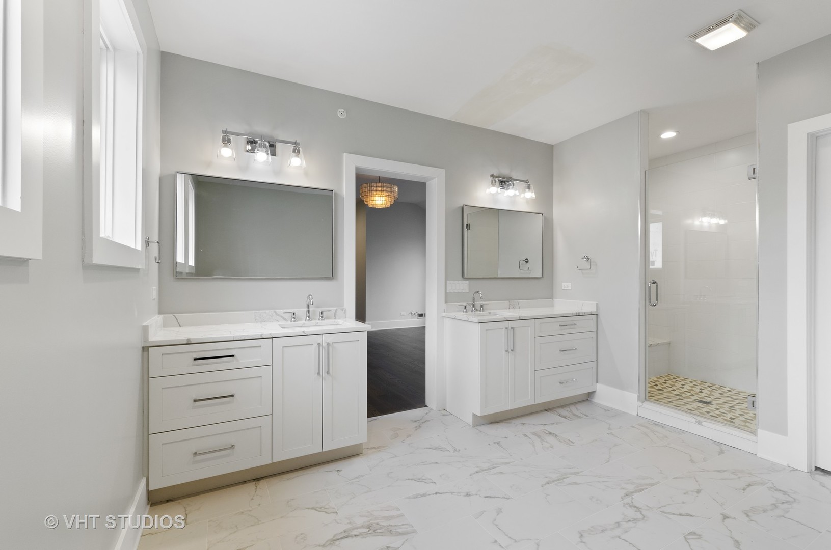 717 Meadow Lane Libertyville, IL 60048 - Photo 14 of 23 a bathroom with a granite countertop sink mirror and bathtub
