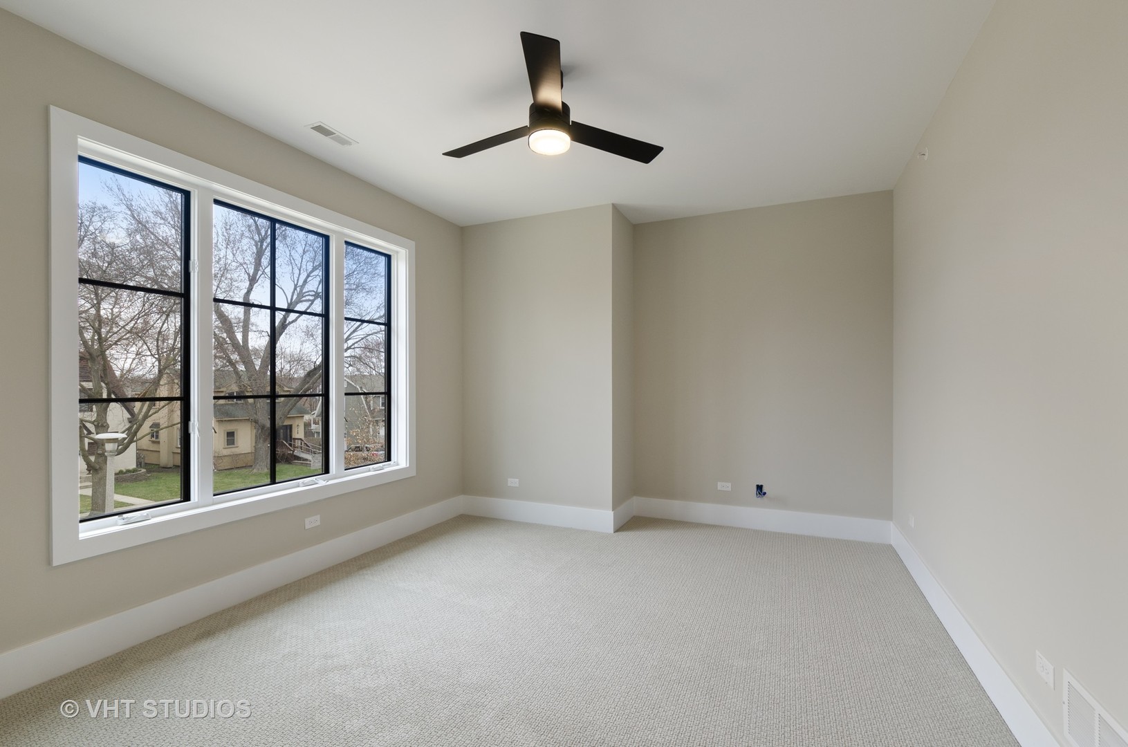 717 Meadow Lane Libertyville, IL 60048 - Photo 16 of 23 a view of an empty room with a window