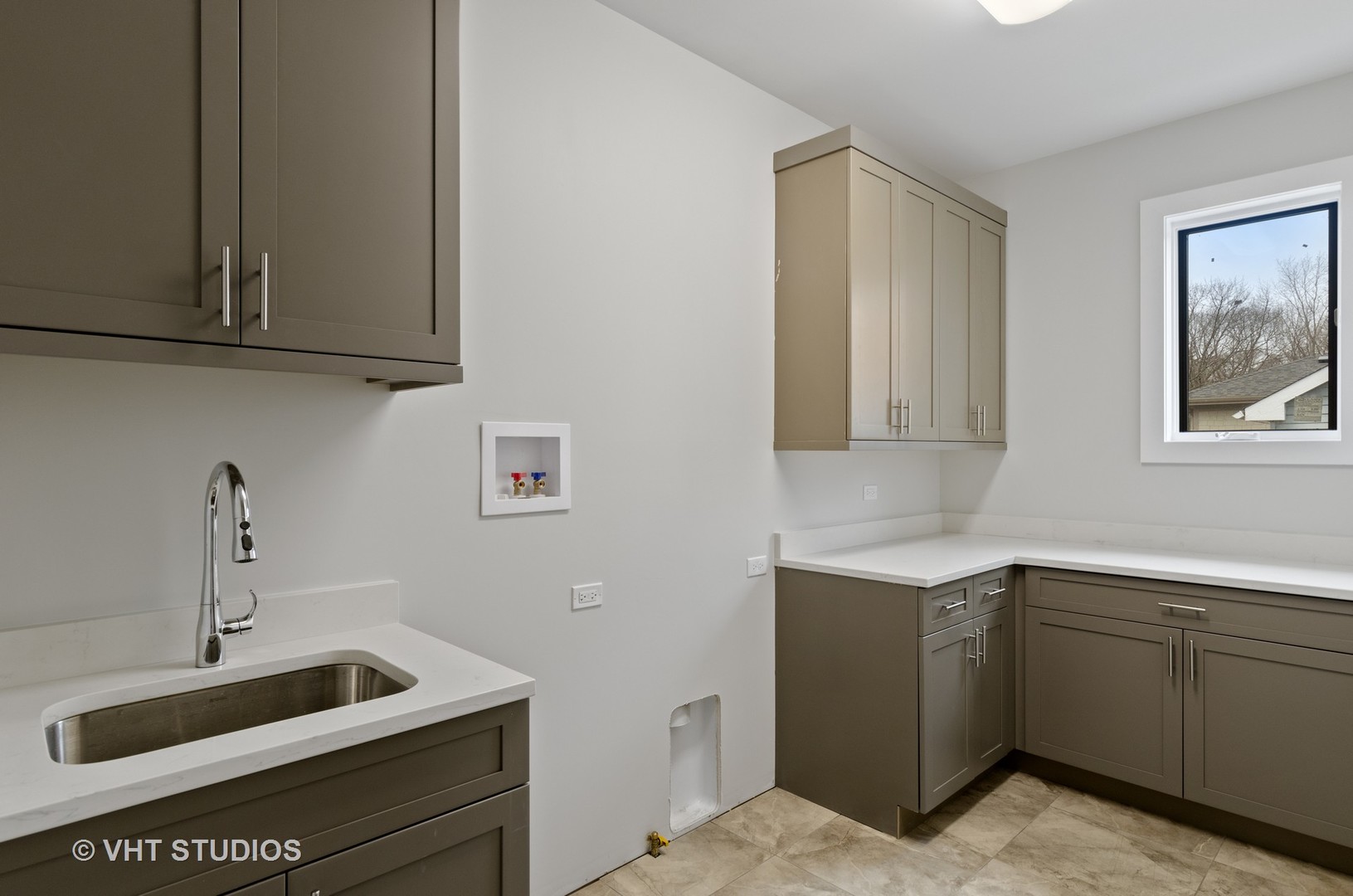 717 Meadow Lane Libertyville, IL 60048 - Photo 20 of 23 a kitchen with sink and cabinets