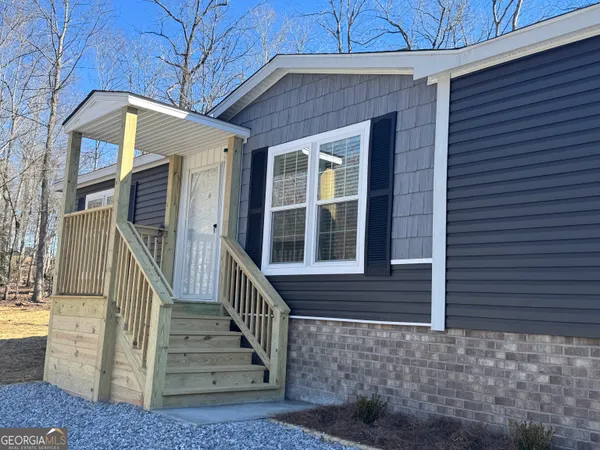 a front view of a house with a window