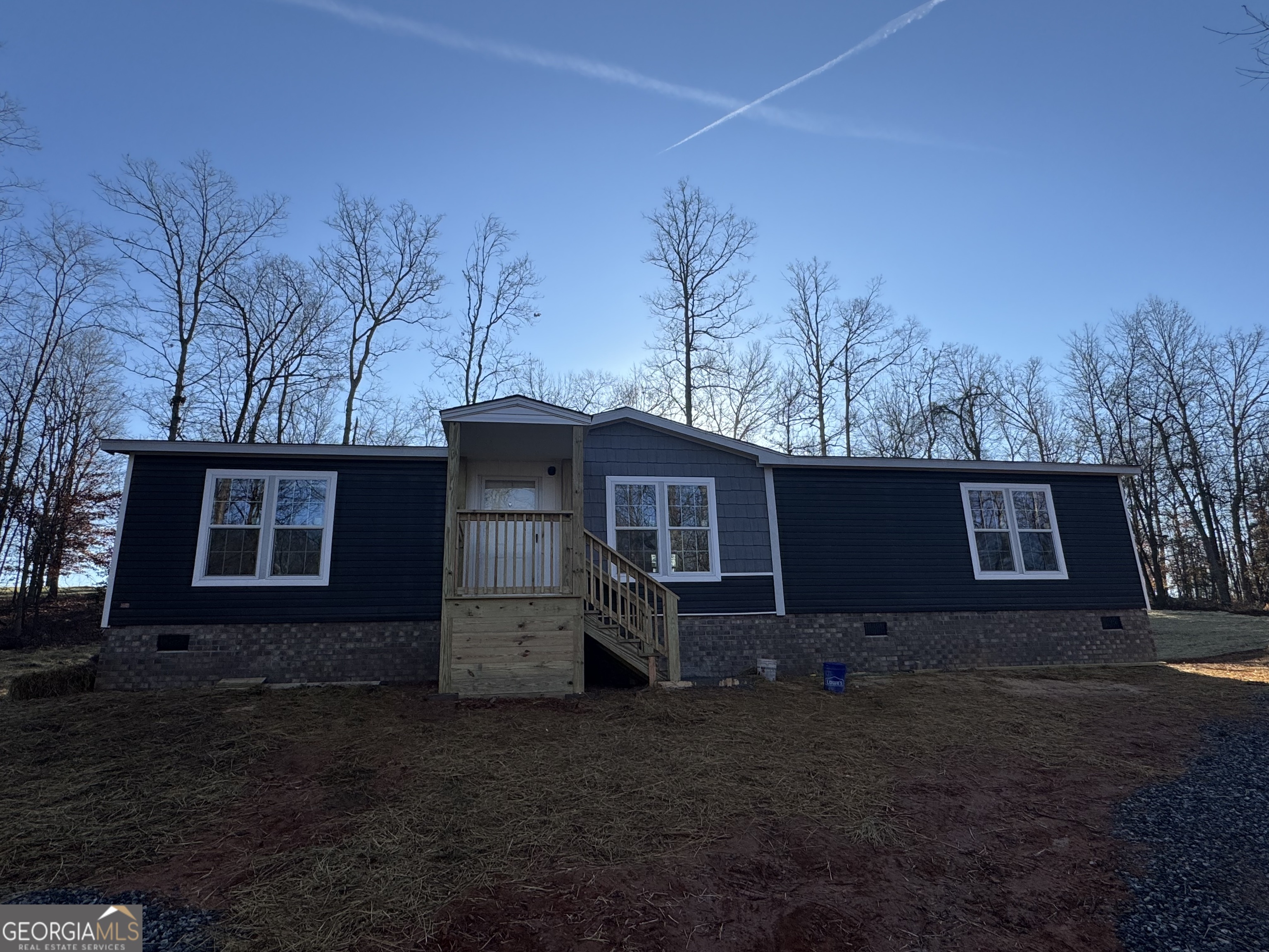 a house view with a backyard space