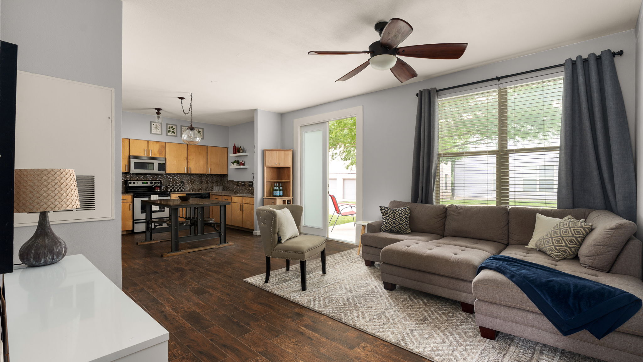 1201 Grove Boulevard, Unit 2802 Austin, TX 78741 - Photo 1 of 21 a living room with furniture and a large window