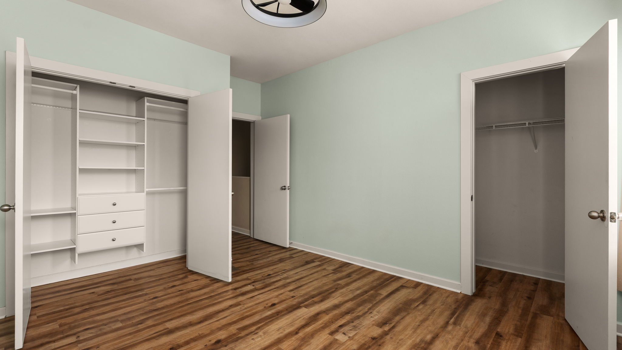 1201 Grove Boulevard, Unit 2802 Austin, TX 78741 - Photo 13 of 21 a view of an empty room and wooden floor