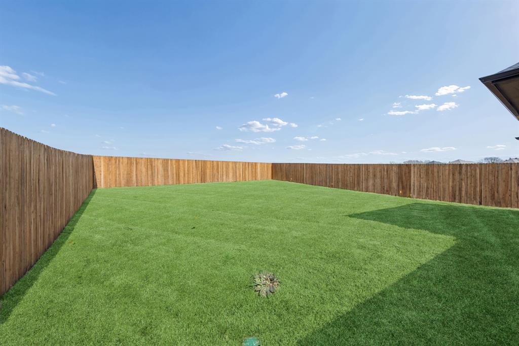 8353 Kingfisher Road Pilot Point, TX 76258 - Photo 35 of 37 Covered Patio in the Oak II home plan by Trophy Signature Homes – REPRESENTATIVE PHOTO