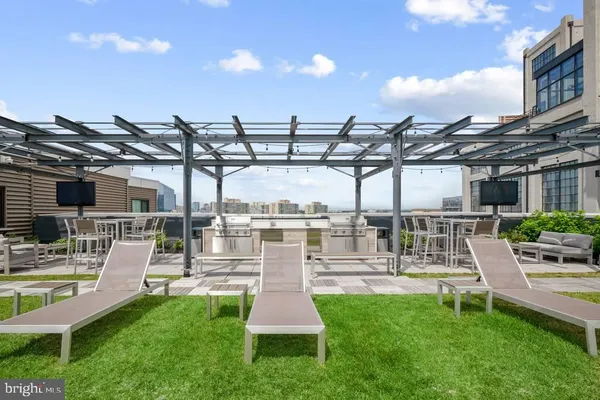 a view of a swimming pool with a patio