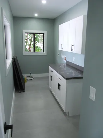 a view of a backyard of the house