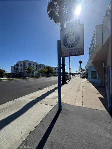 an aerial view of residential house with outdoor space and parking
