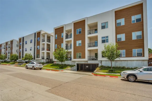 a view of street with parked cars