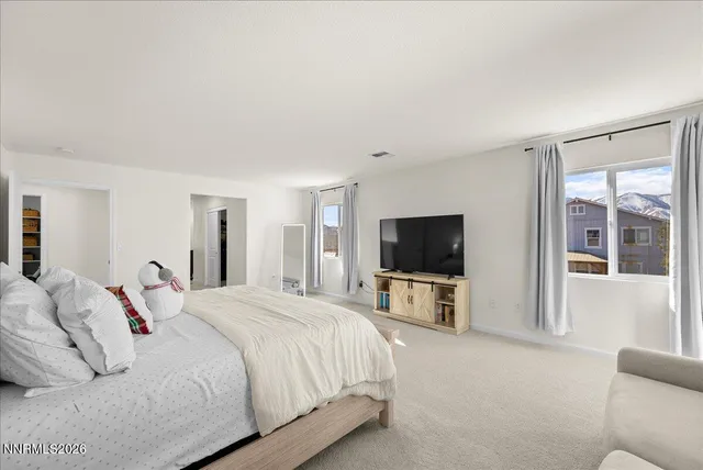 a bathroom with a double vanity sink and mirror