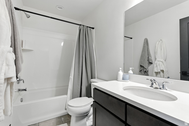 6039 North Westridge Road Heber City, UT 84032 - Photo 10 of 22 Bathroom featuring a single vanity with a white countertop, an undermount sink, and chrome fixtures