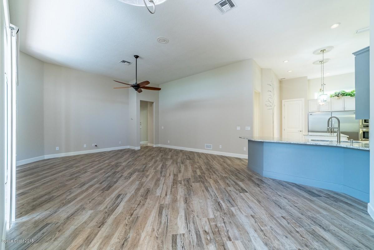 1725 Canterbury Drive Indialantic, FL 32903 - Photo 15 of 22 a view of a kitchen with wooden floor and a sink