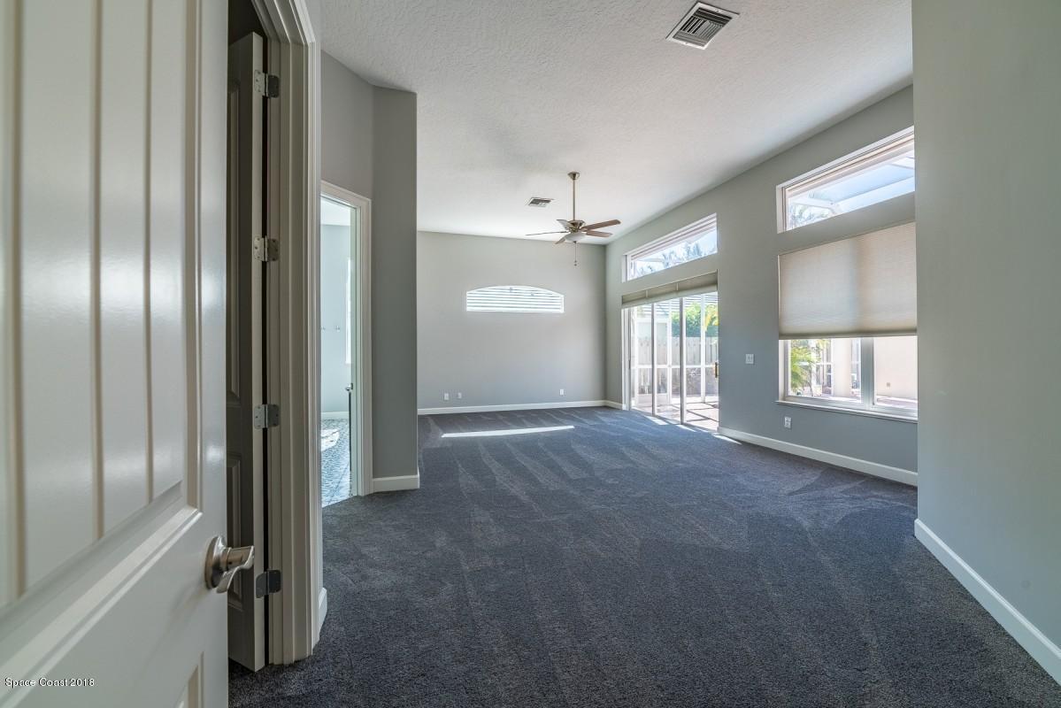 1725 Canterbury Drive Indialantic, FL 32903 - Photo 9 of 22 a view of an empty room and window in a room