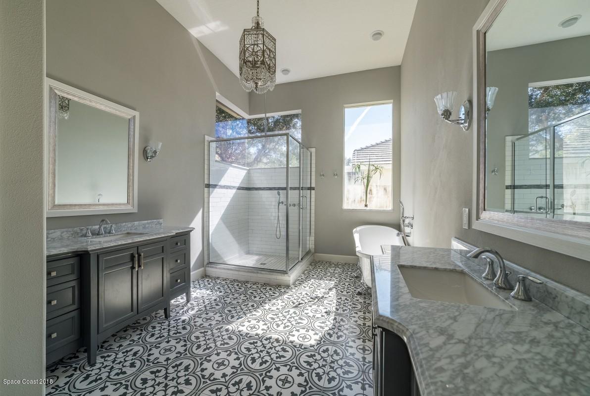 1725 Canterbury Drive Indialantic, FL 32903 - Photo 10 of 22 a view of a kitchen area with furniture and chandelier