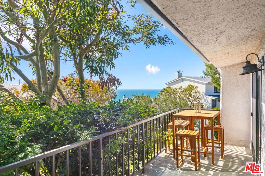 6801 Seawatch Lane Malibu, CA 90265 - Photo 7 of 34 a view of a balcony with an outdoor space