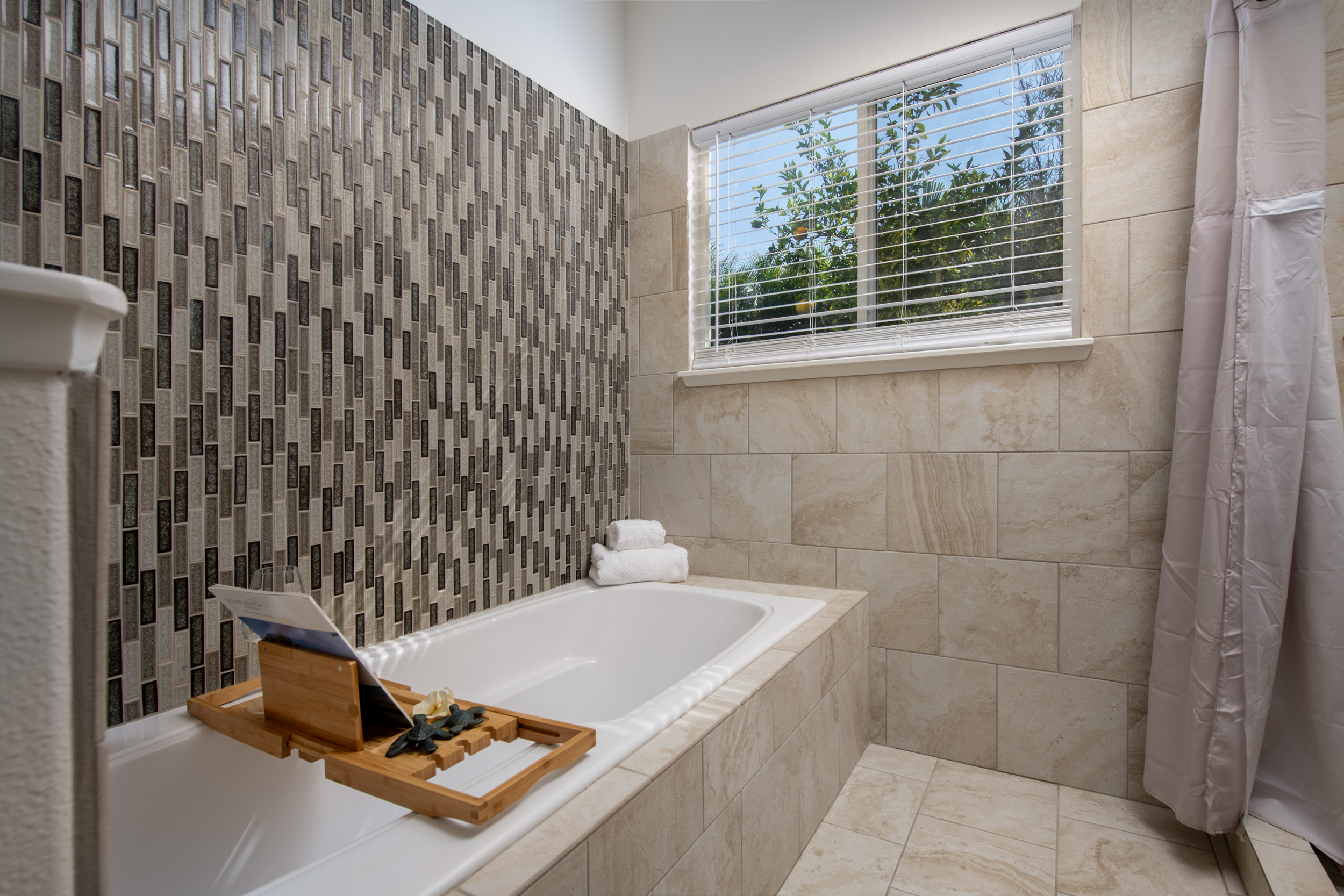 68-3559 Awamoa Place Waikoloa, HI 96738 - Photo 11 of 28 a bathroom with a tub and a sink