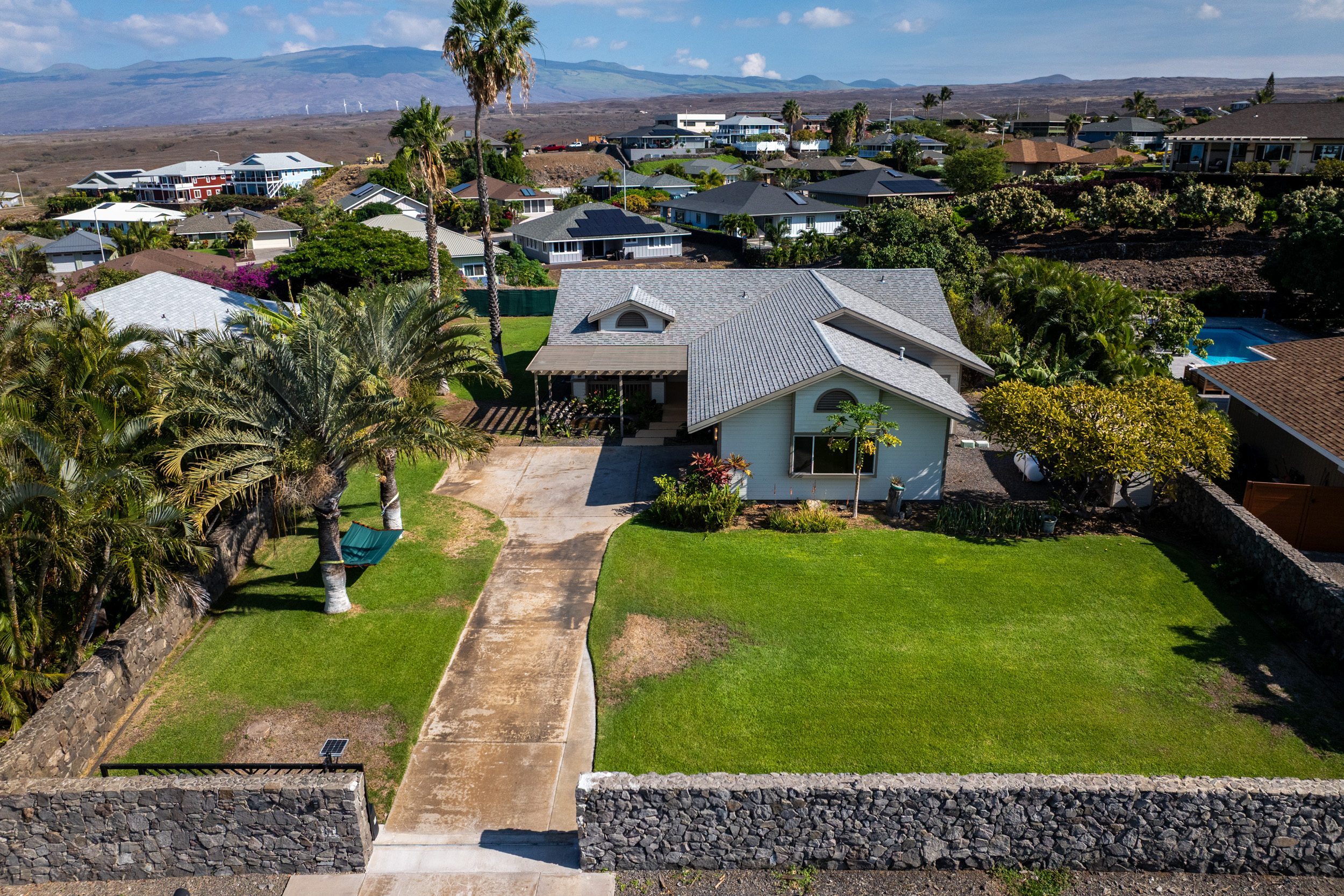 68-3559 Awamoa Place Waikoloa, HI 96738 - Photo 16 of 28 a aerial view of a house with a yard