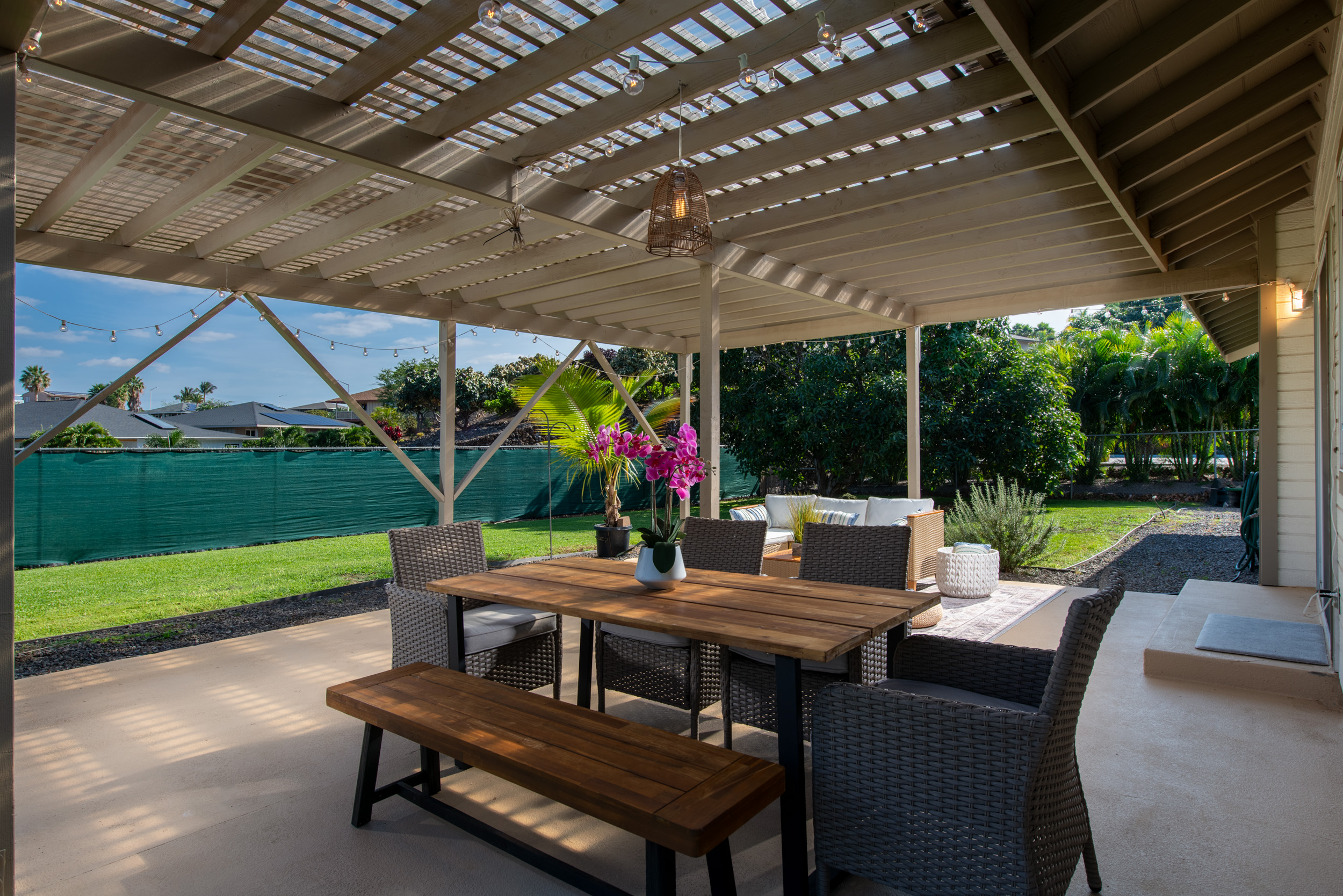 68-3559 Awamoa Place Waikoloa, HI 96738 - Photo 20 of 28 a view of a patio with a table chairs and a yard
