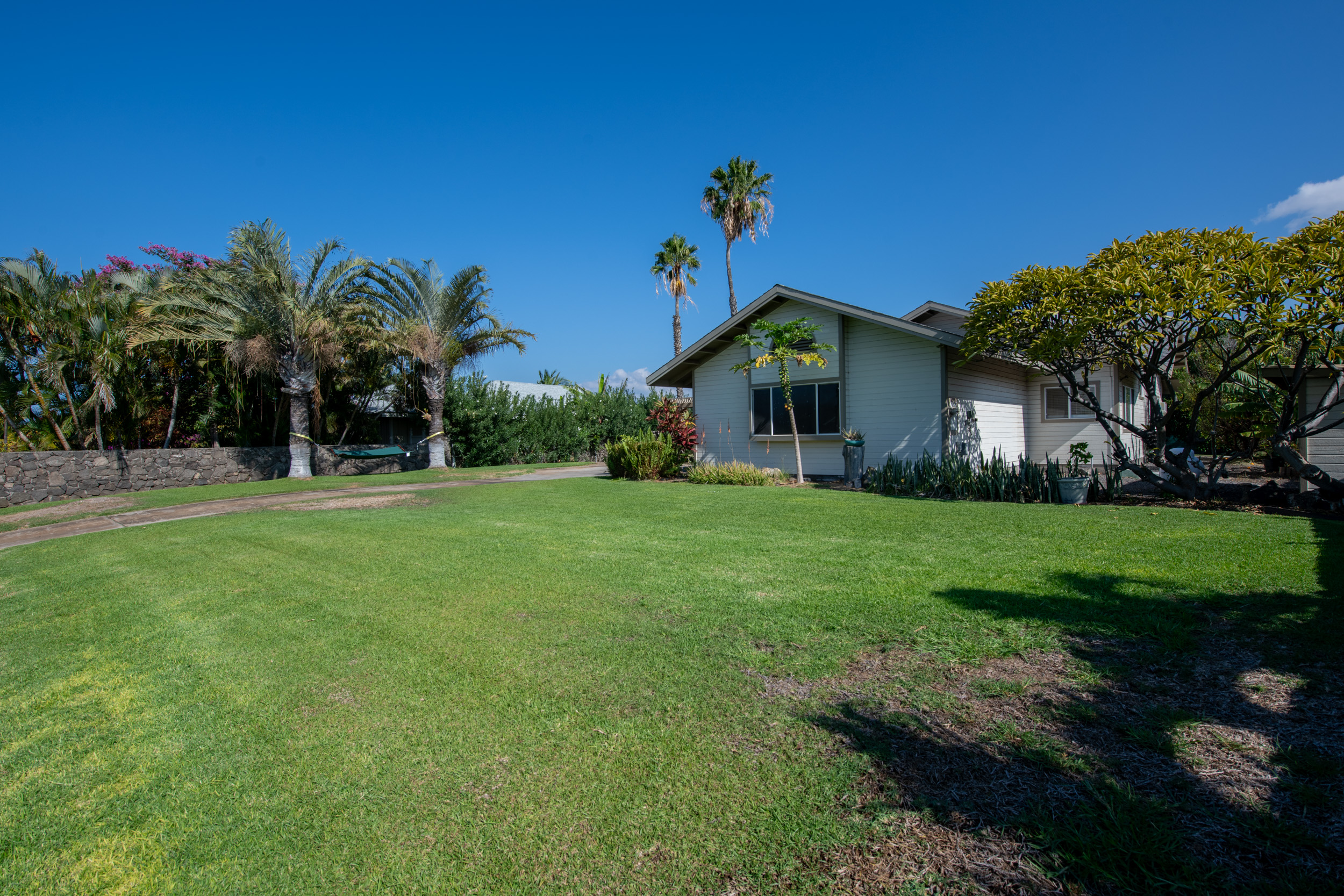 68-3559 Awamoa Place Waikoloa, HI 96738 - Photo 26 of 28 a front view of a house with garden