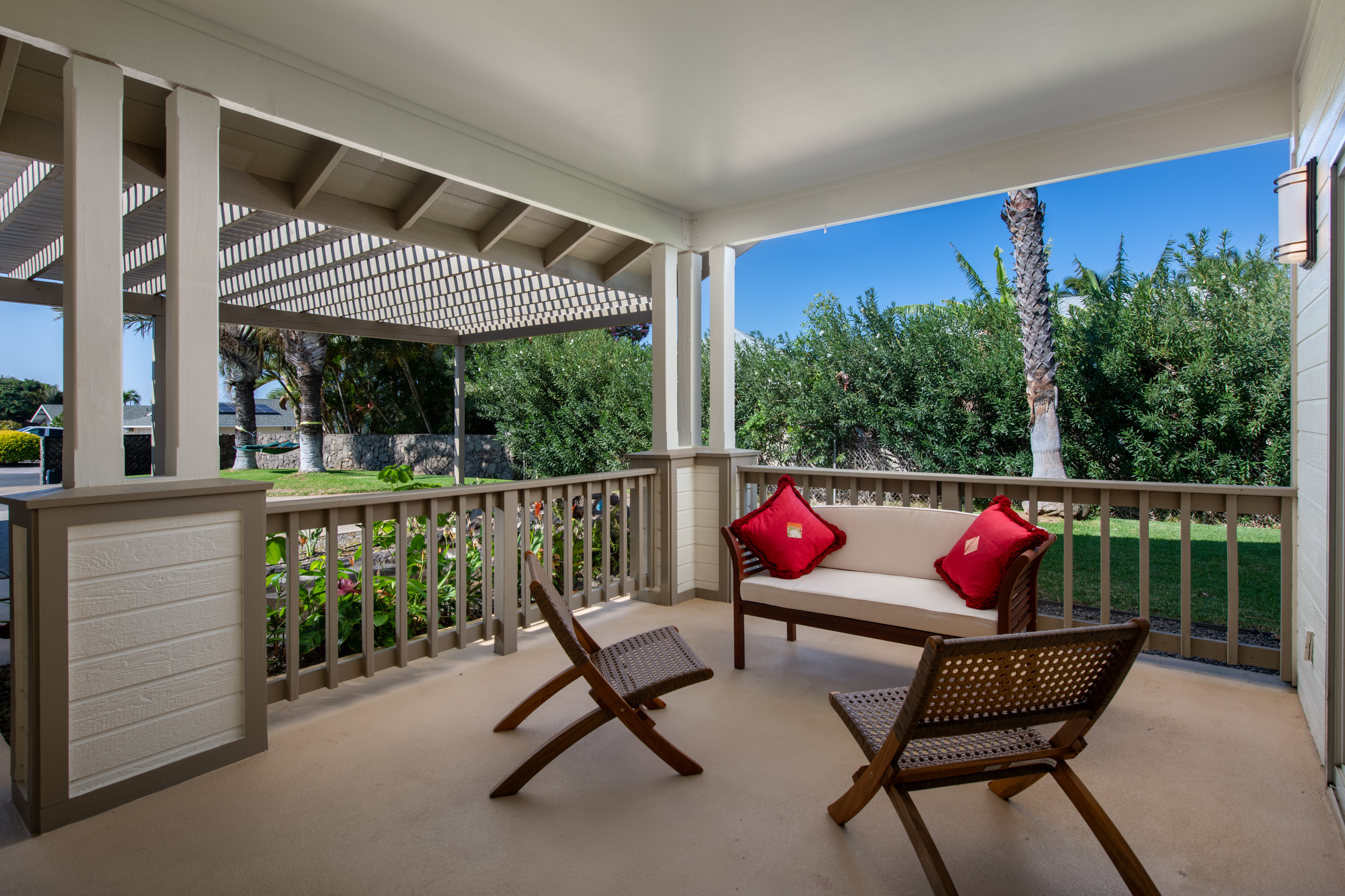 68-3559 Awamoa Place Waikoloa, HI 96738 - Photo 3 of 28 a wooden bench sitting in front of a building