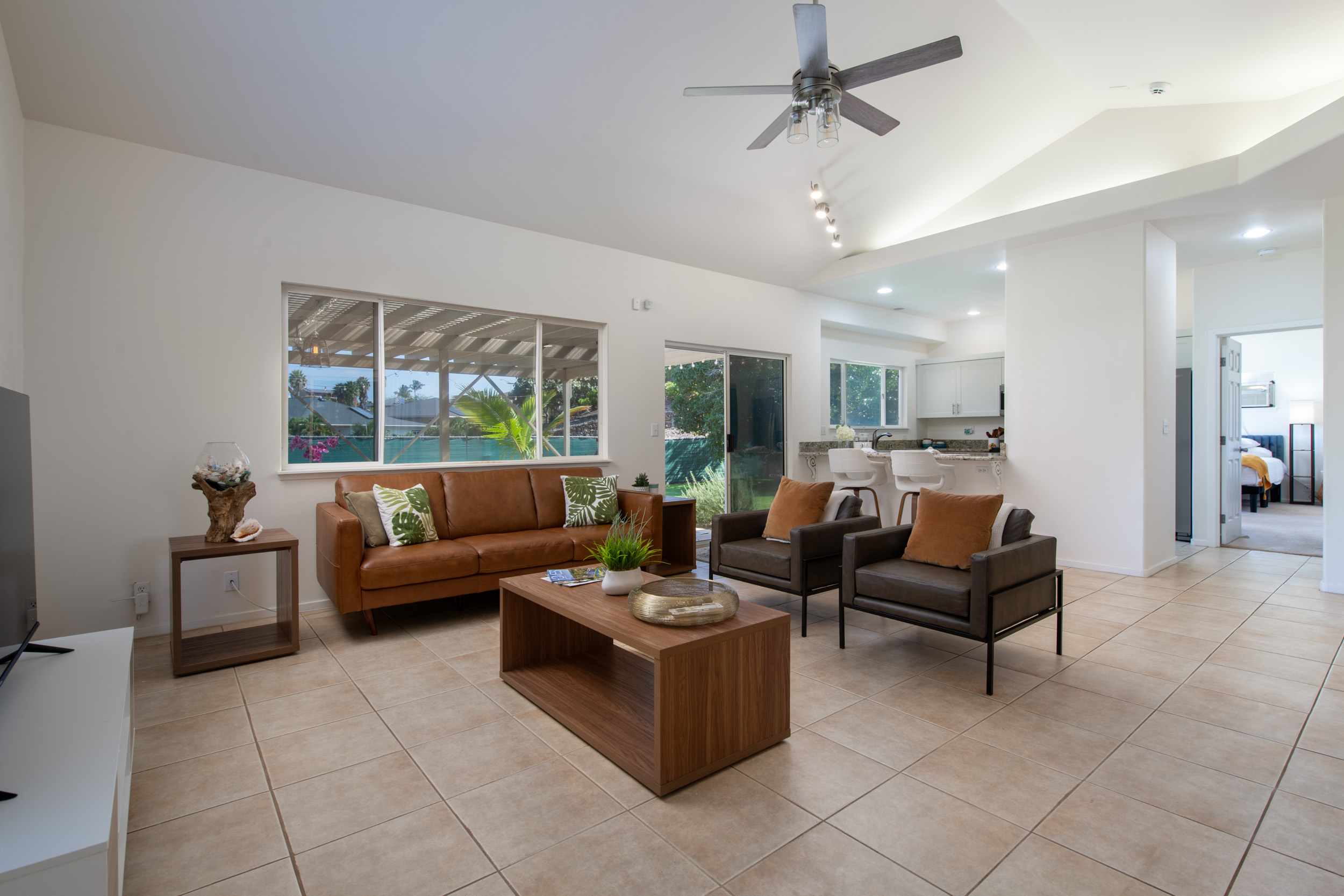 68-3559 Awamoa Place Waikoloa, HI 96738 - Photo 6 of 28 a living room with furniture and a large window