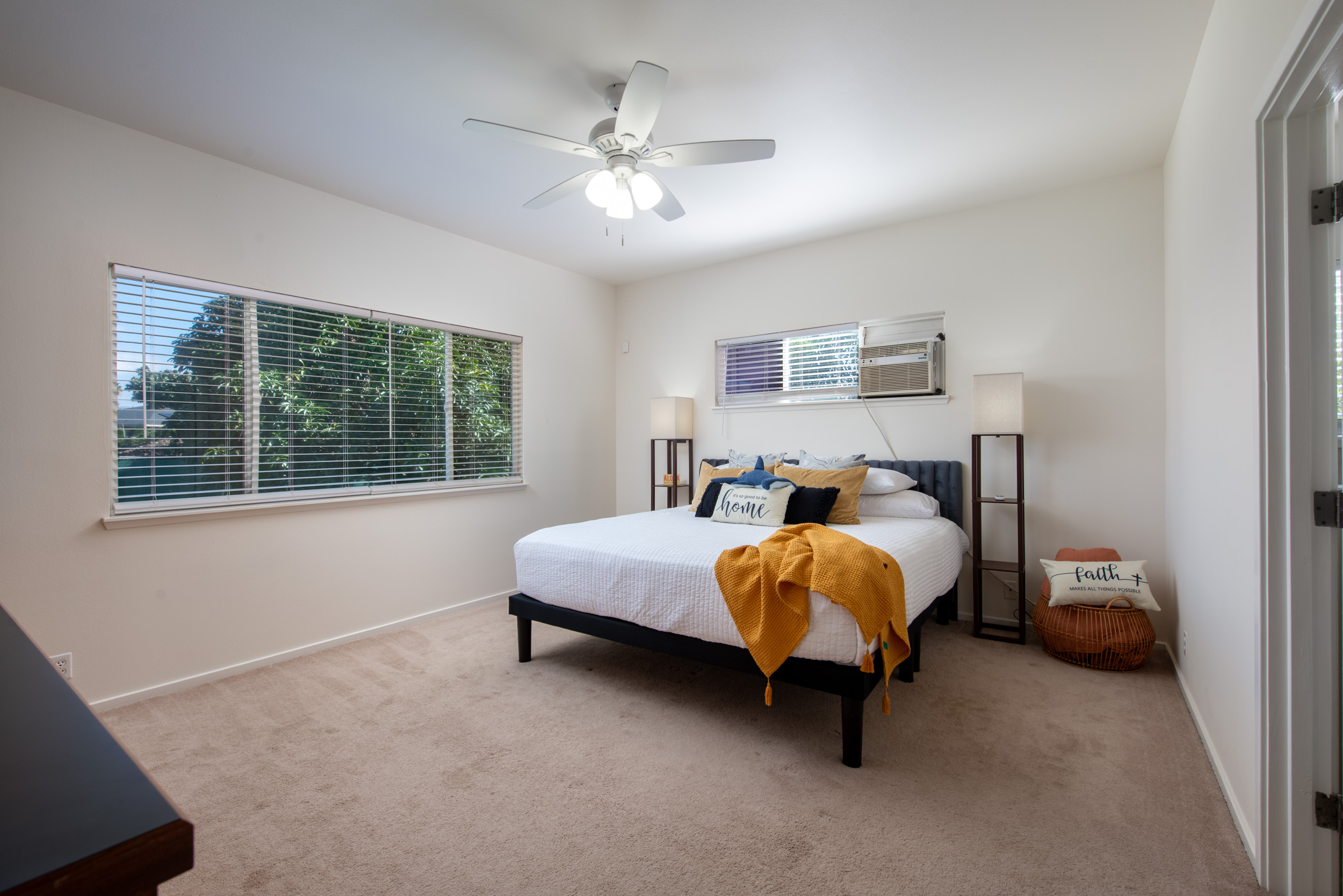 68-3559 Awamoa Place Waikoloa, HI 96738 - Photo 9 of 28 a spacious bedroom with a bed and a window