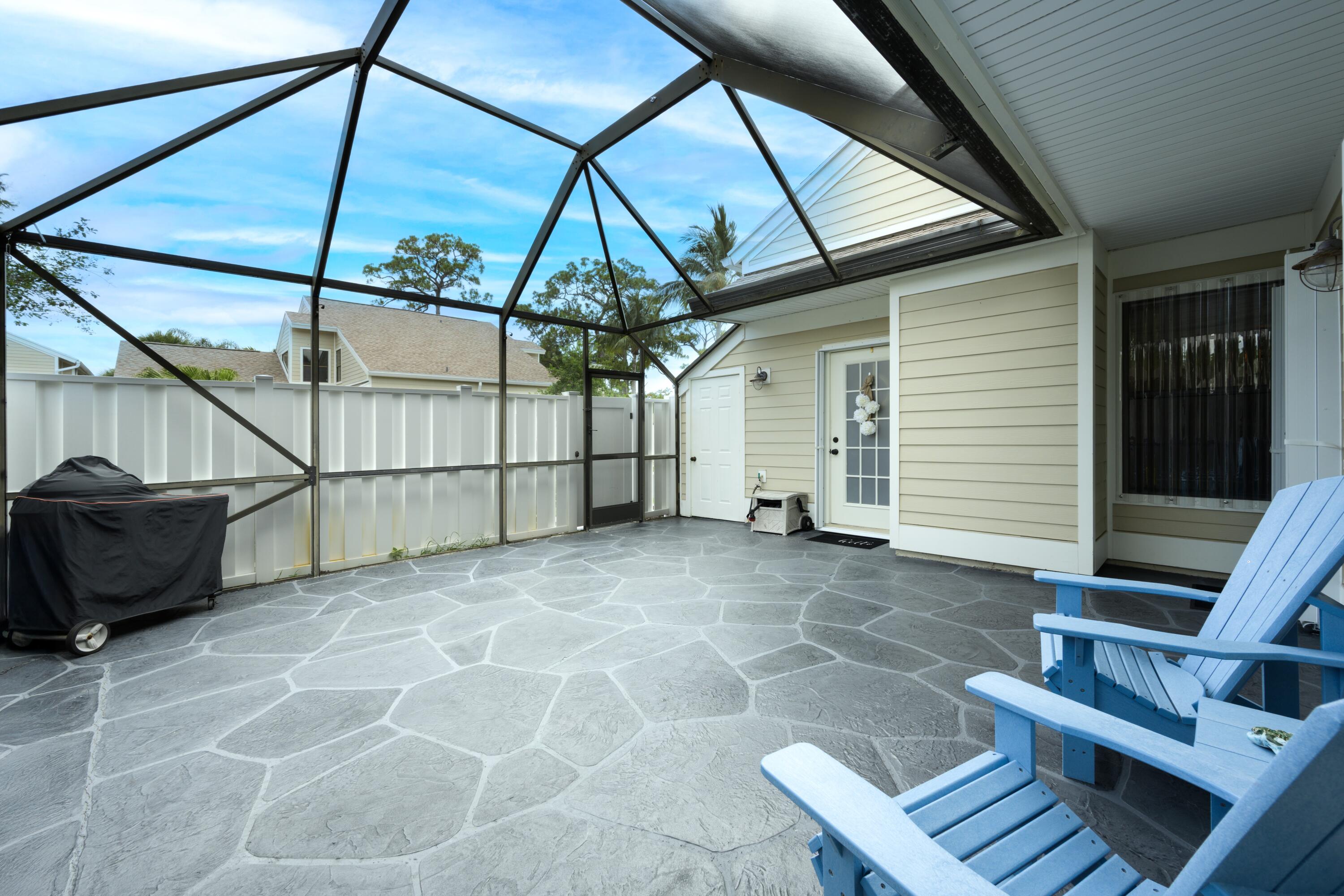 1202 Summerwinds Lane Jupiter, FL 33458 - Photo 19 of 38 Screened Patio