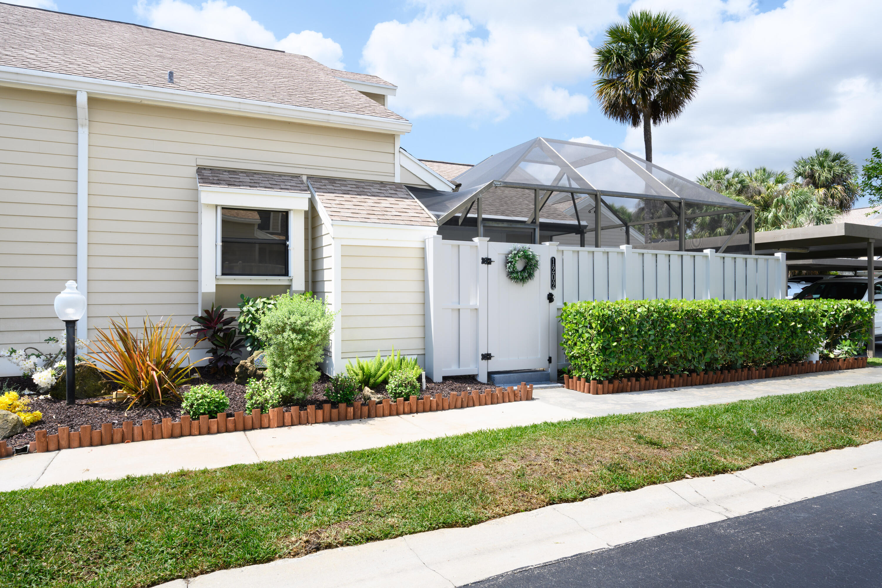 1202 Summerwinds Lane Jupiter, FL 33458 - Photo 20 of 38 Exterior