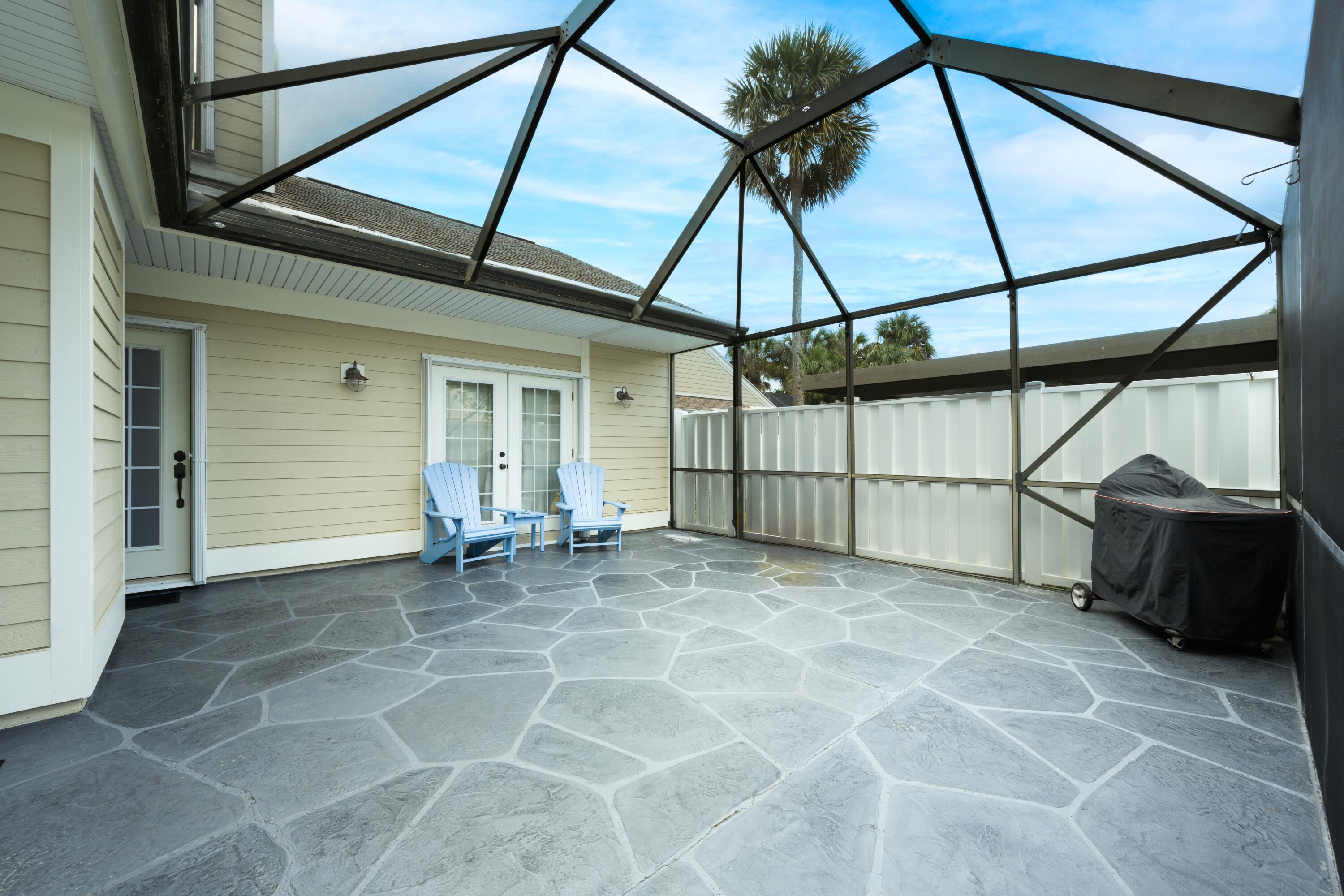 1202 Summerwinds Lane Jupiter, FL 33458 - Photo 2 of 38 Screened Patio
