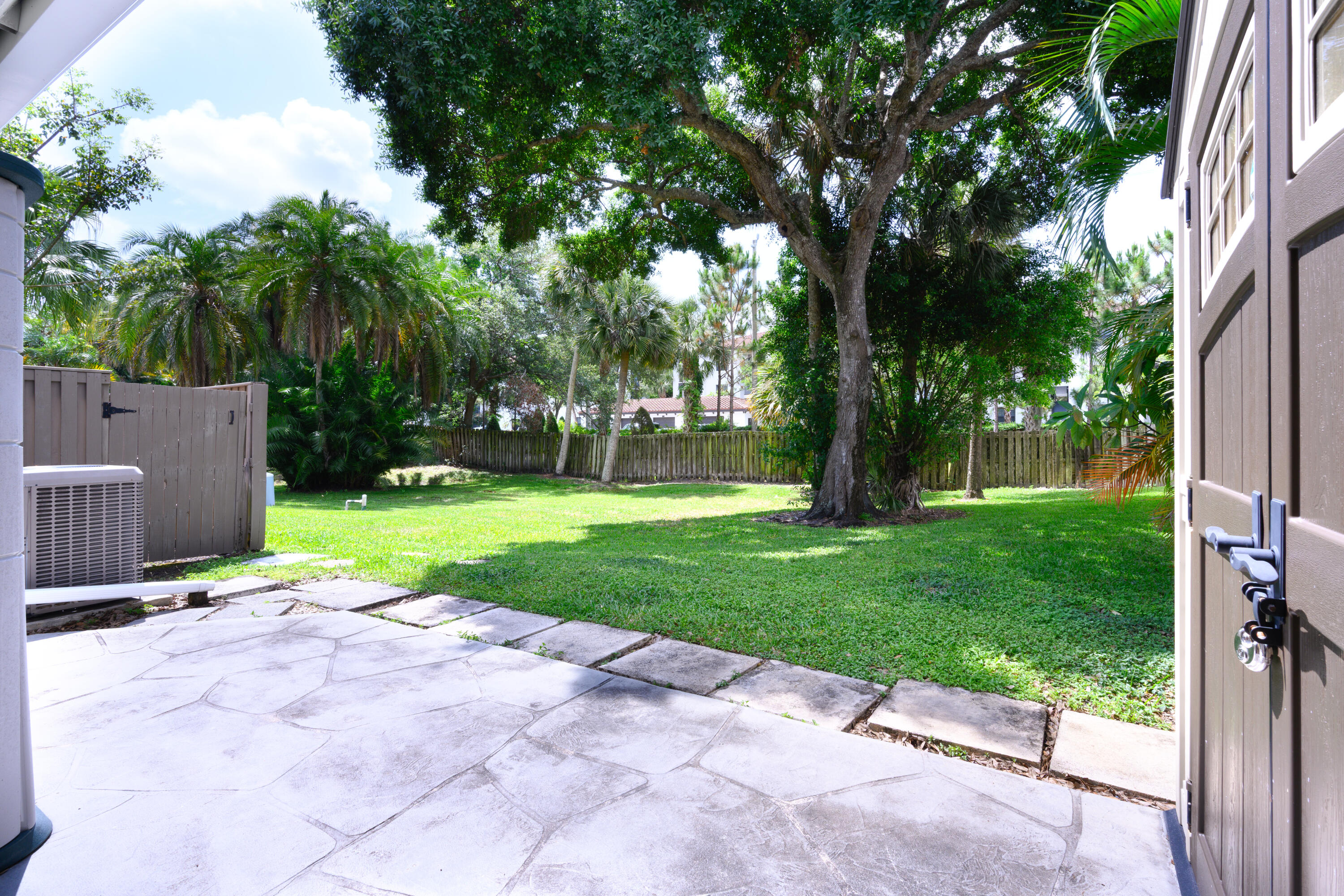 1202 Summerwinds Lane Jupiter, FL 33458 - Photo 21 of 38 Back Yard Green Space
