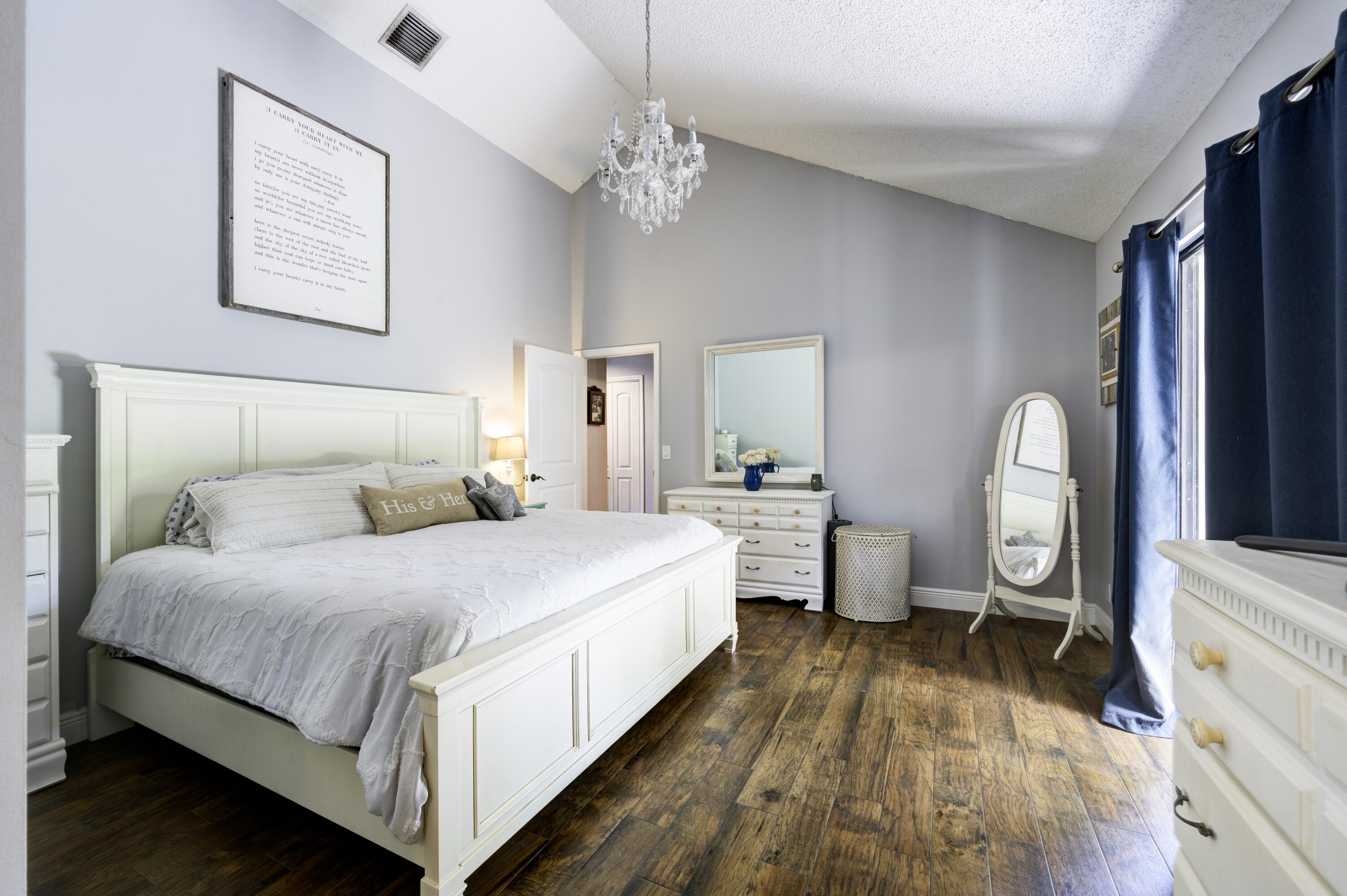 1202 Summerwinds Lane Jupiter, FL 33458 - Photo 9 of 38 First floor Primary Bedroom