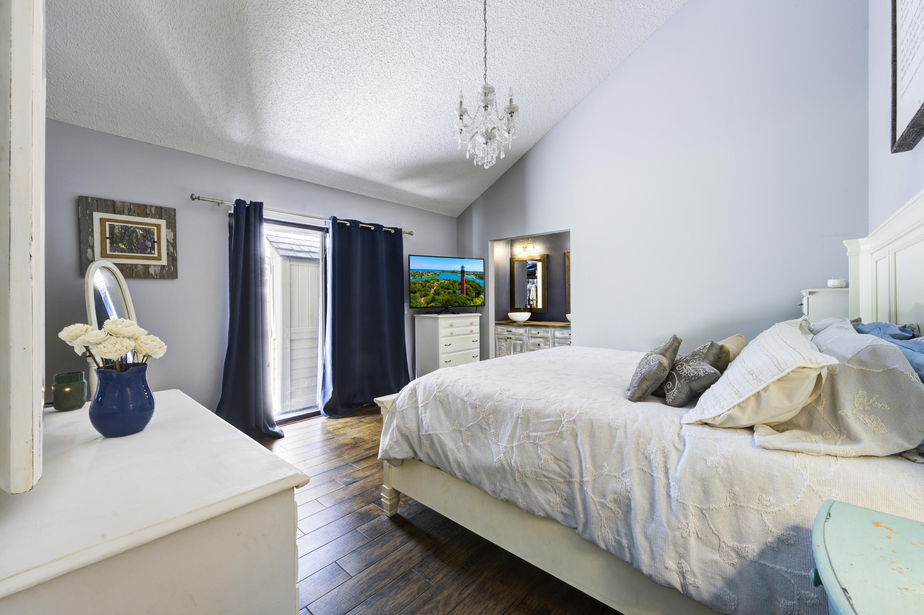 1202 Summerwinds Lane Jupiter, FL 33458 - Photo 10 of 38 First floor Primary Bedroom