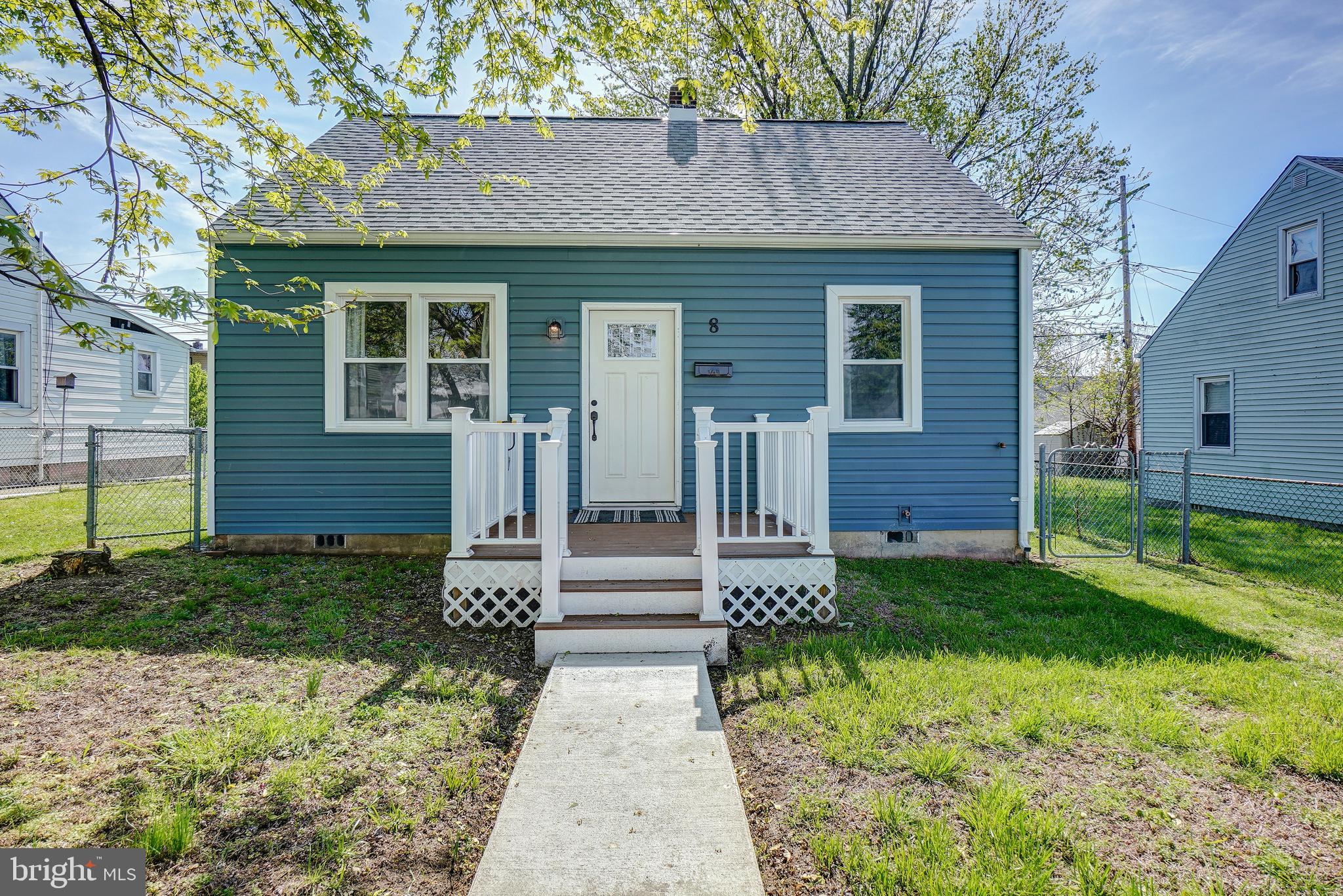 8 Avenal Road Essex, MD 21221 - Photo 2 of 17 a front view of a house with garden