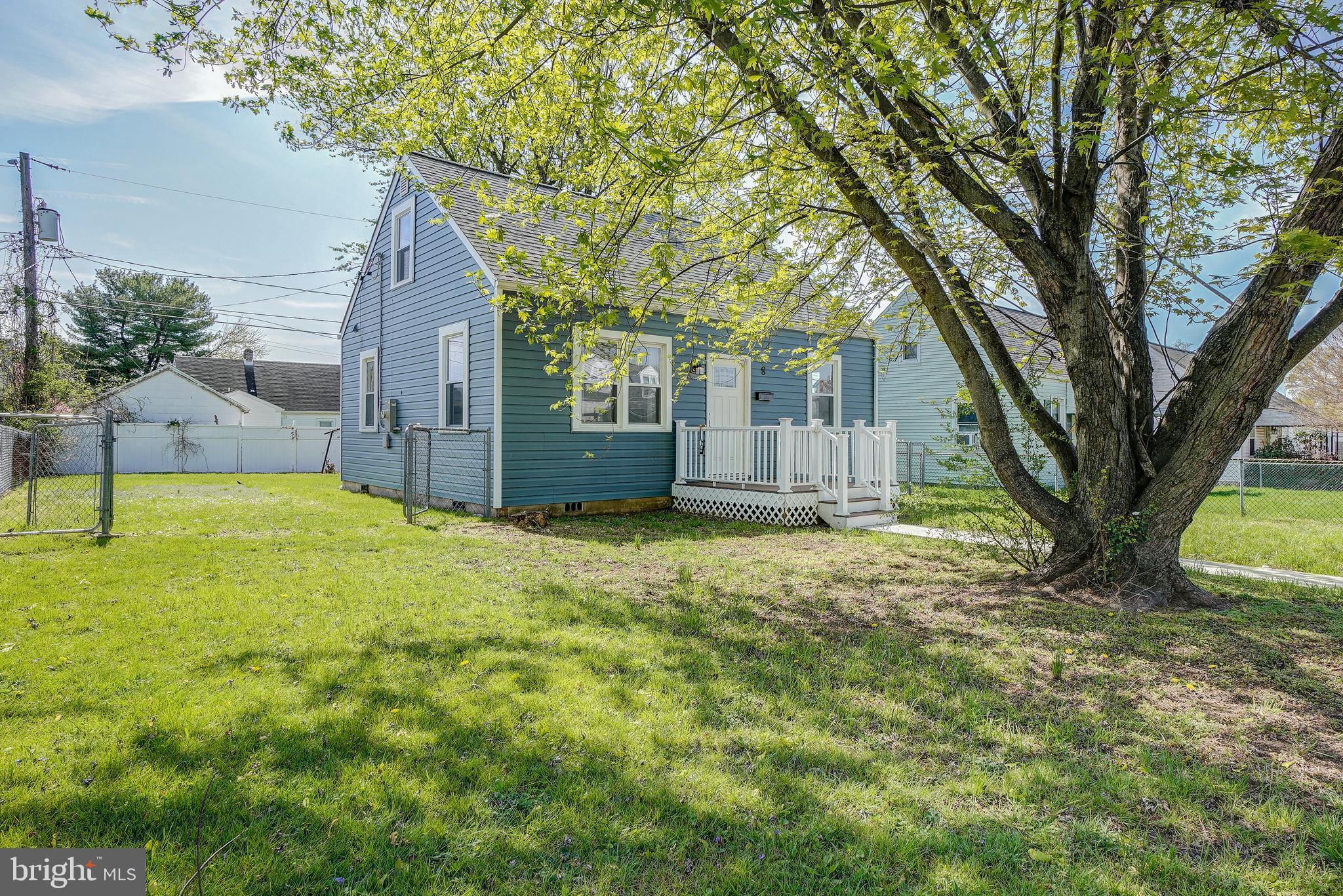 8 Avenal Road Essex, MD 21221 - Photo 3 of 17 a view of a house with a yard