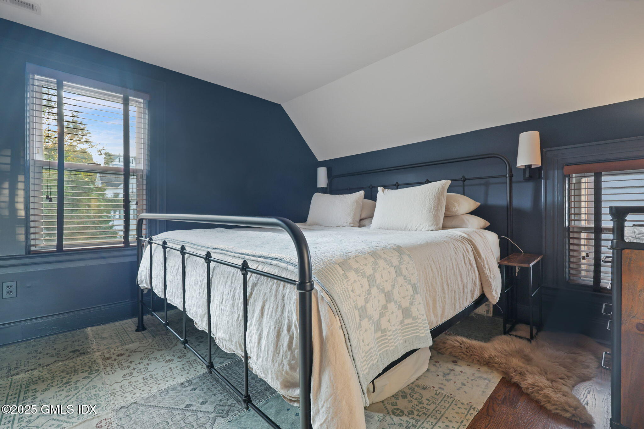 9 Cottage Place Greenwich, CT 06830 - Photo 14 of 21 a bedroom with a bed and a window