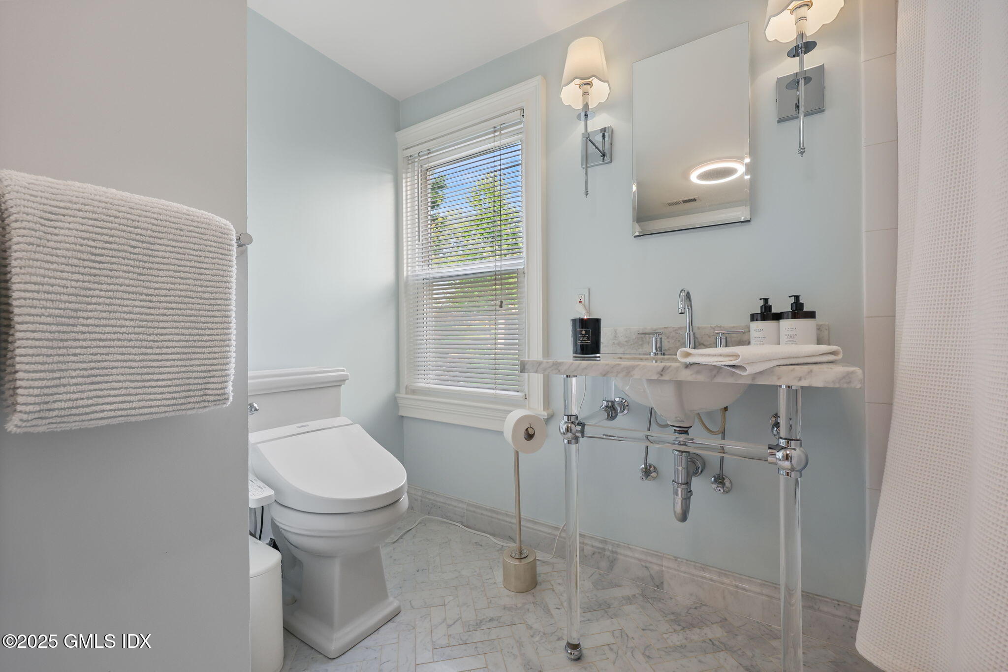 9 Cottage Place Greenwich, CT 06830 - Photo 15 of 21 a bathroom with a sink toilet and mirror