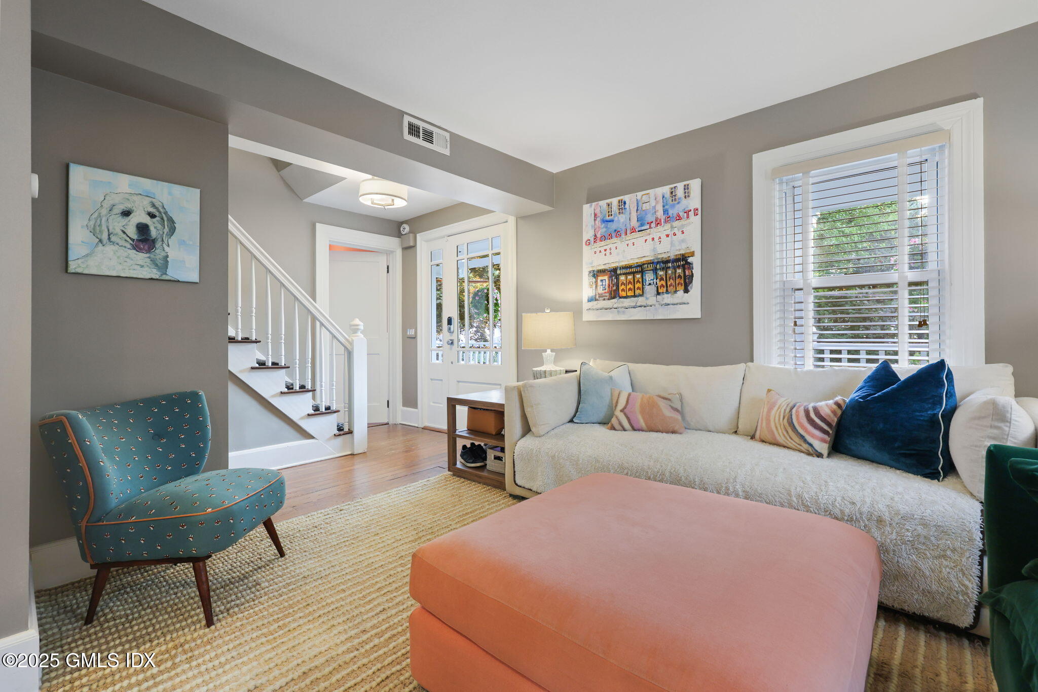 9 Cottage Place Greenwich, CT 06830 - Photo 5 of 21 a bedroom with furniture and a window