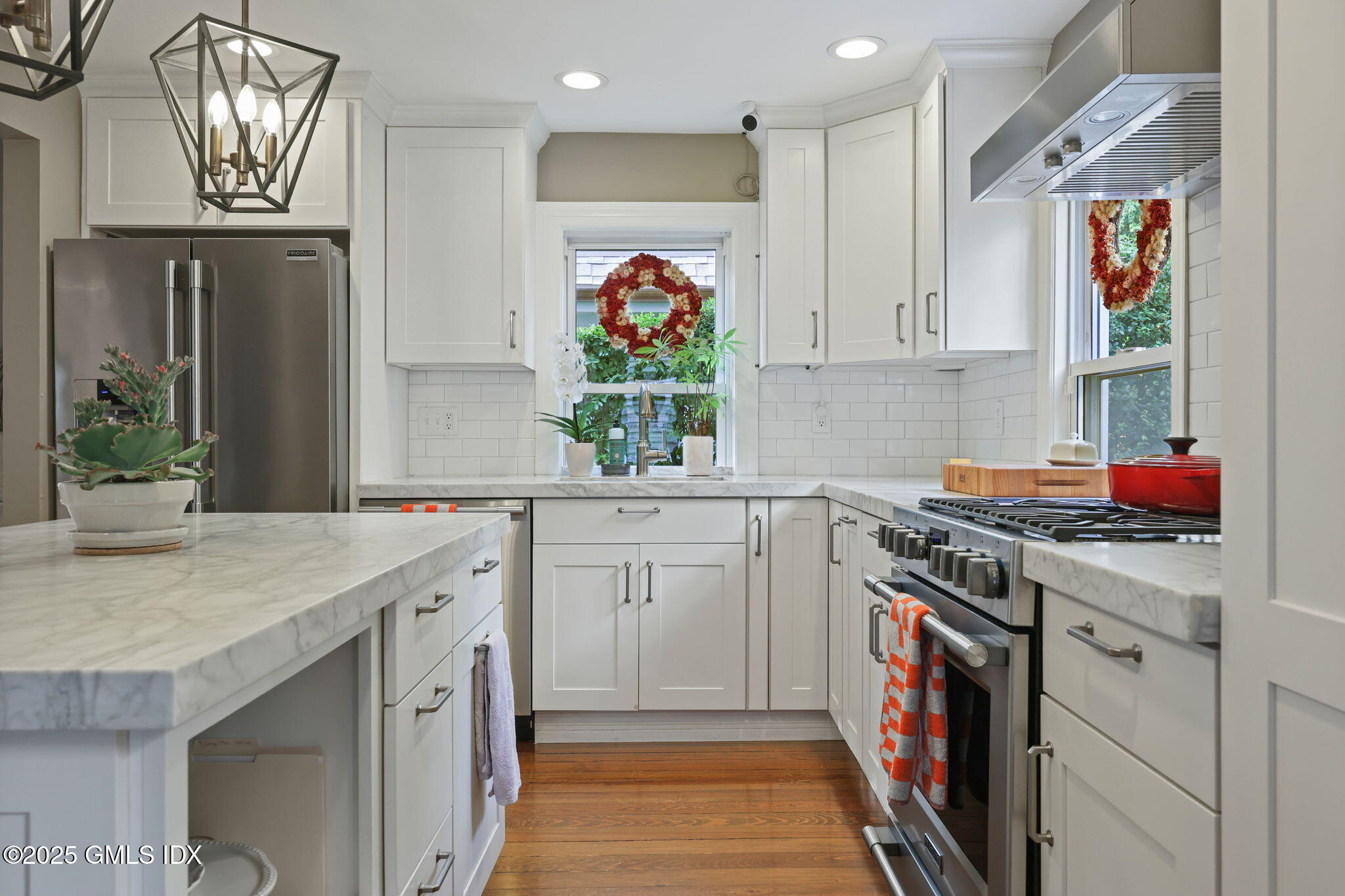 9 Cottage Place Greenwich, CT 06830 - Photo 9 of 21 a kitchen with stainless steel appliances granite countertop a sink and cabinets