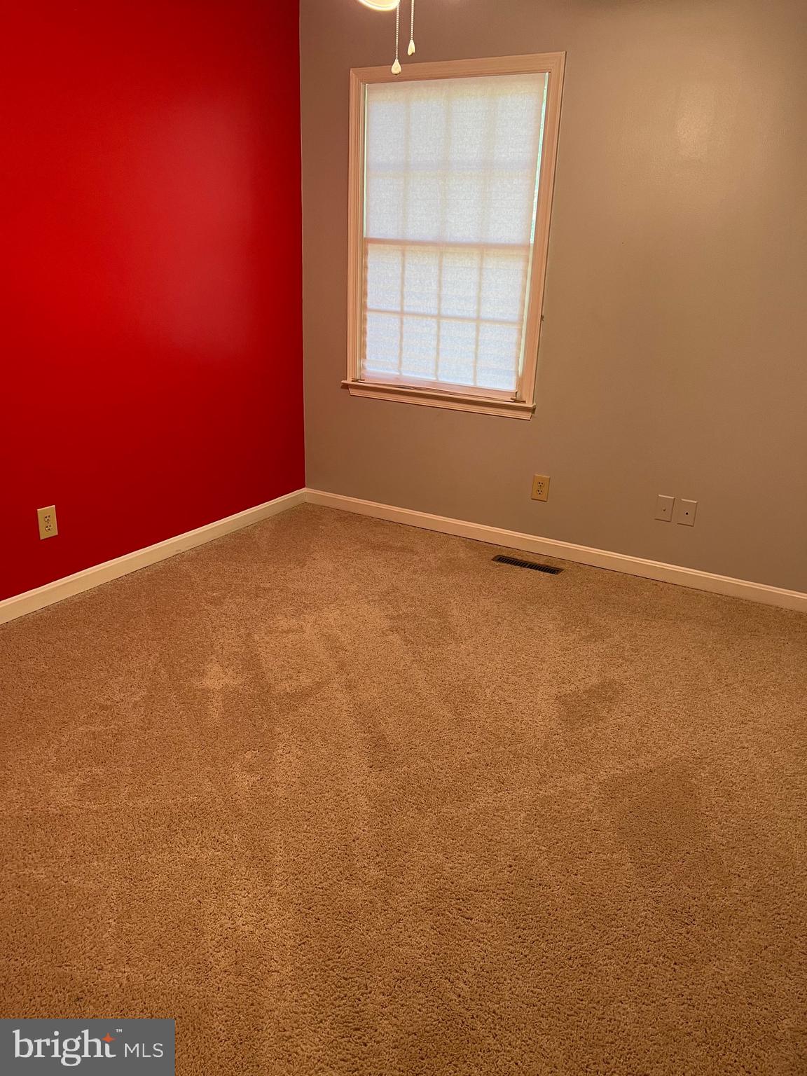 42454 Wilderness Road Leonardtown, MD 20650 - Photo 18 of 22 Red accent wall to be painted gray