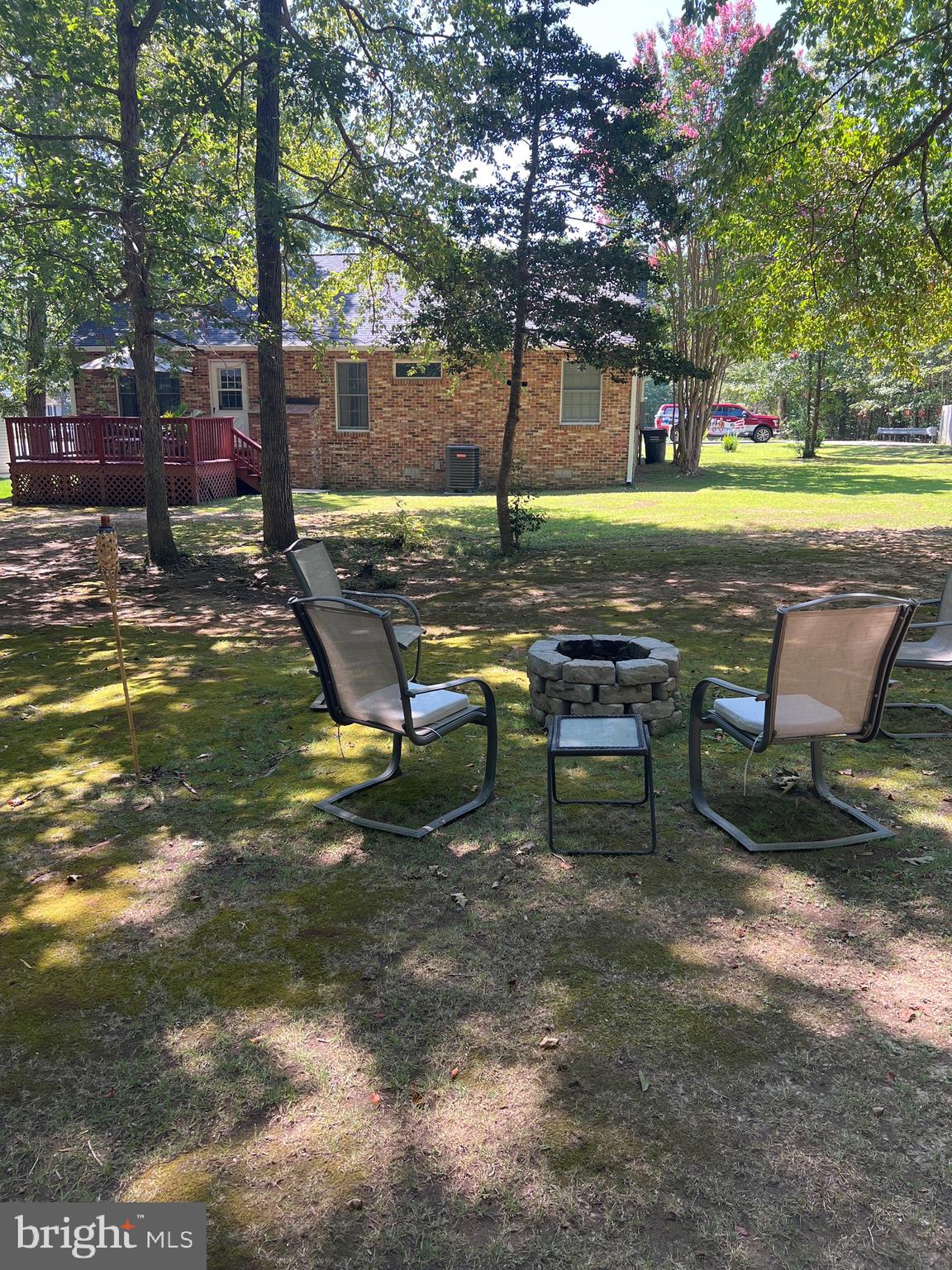 42454 Wilderness Road Leonardtown, MD 20650 - Photo 4 of 22 Plenty of back yard with fire pit and shed.