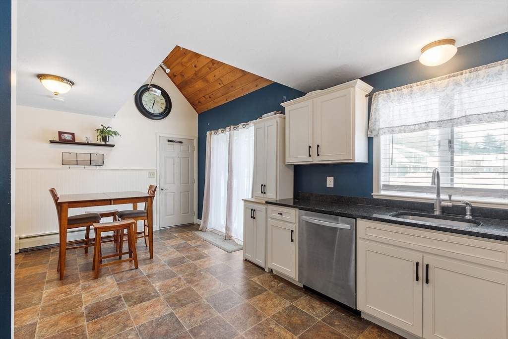 64 Peabody Road, Unit A Shirley, MA 01464 - Photo 8 of 29 a kitchen with a sink cabinets and window